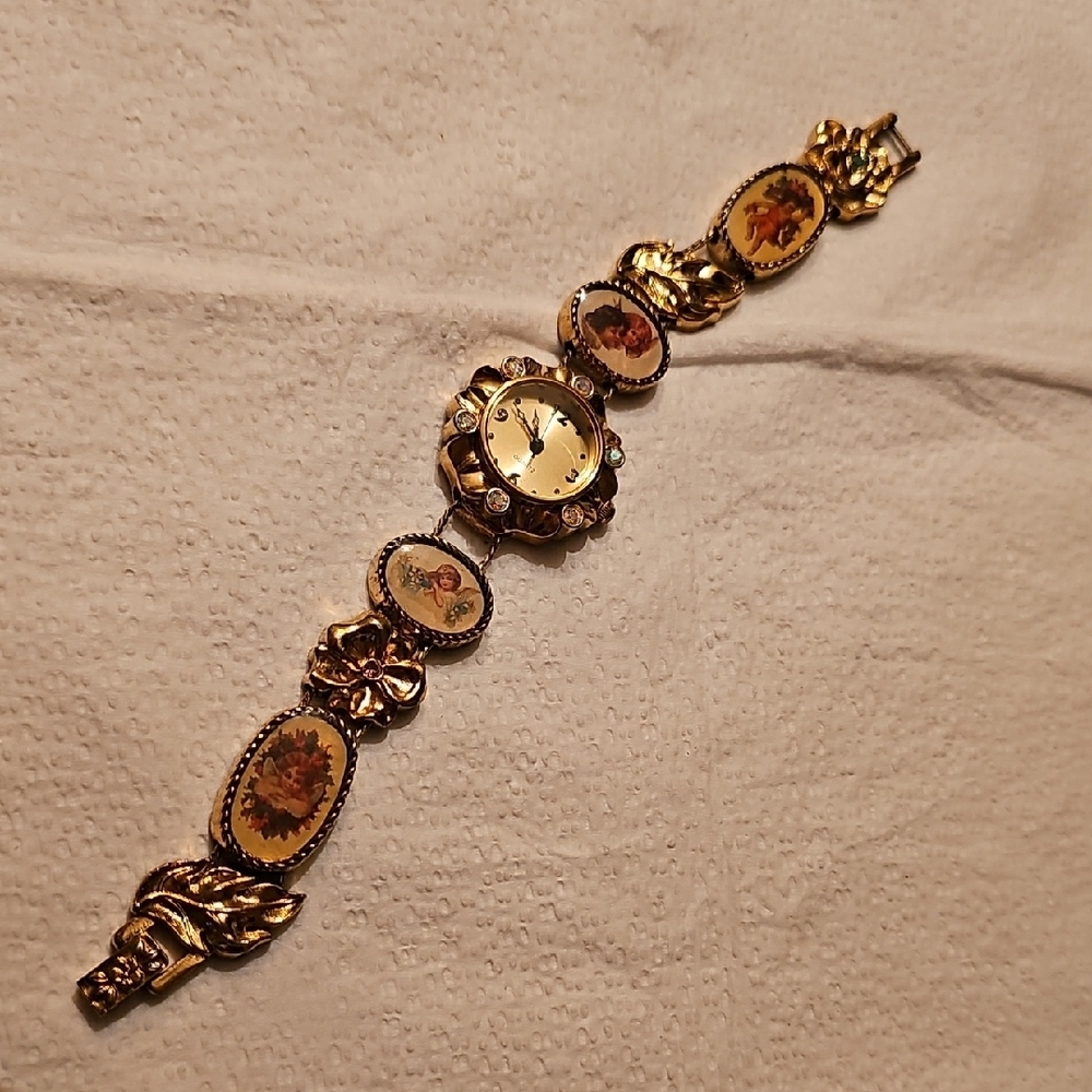 extremely rare gold angel watch - working
